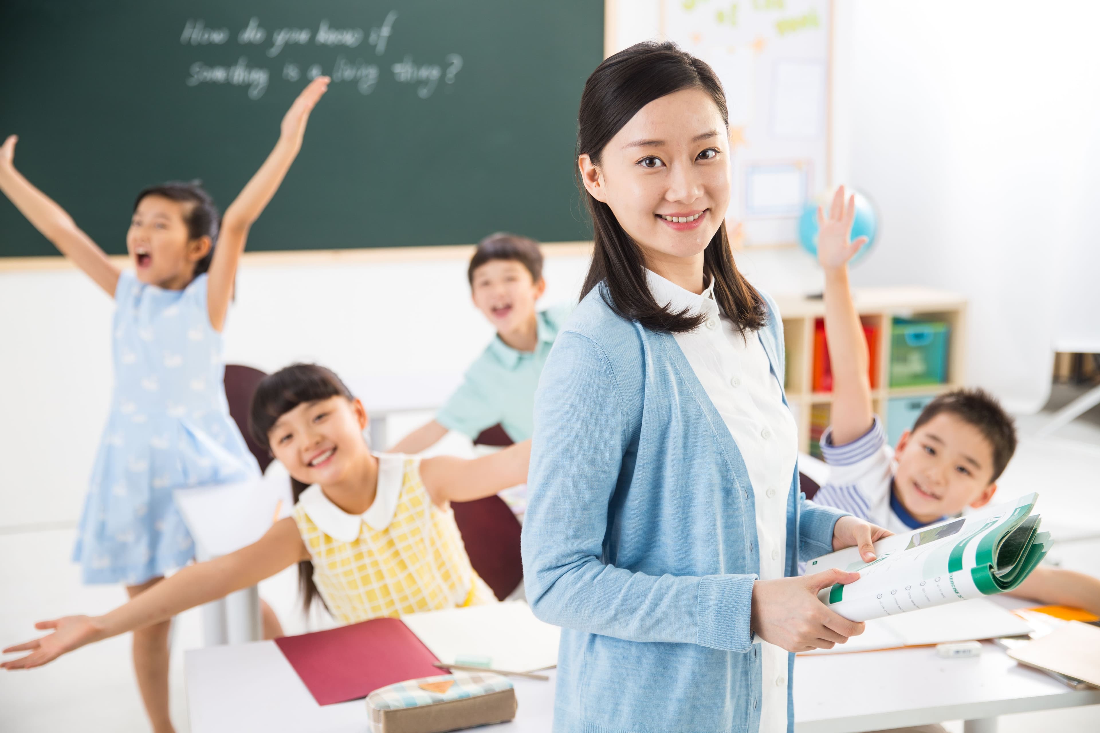 Female teacher with students fun